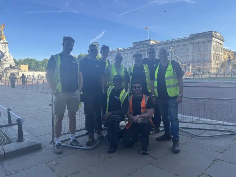 The PMY team in front of Buckingham Palace on parade day